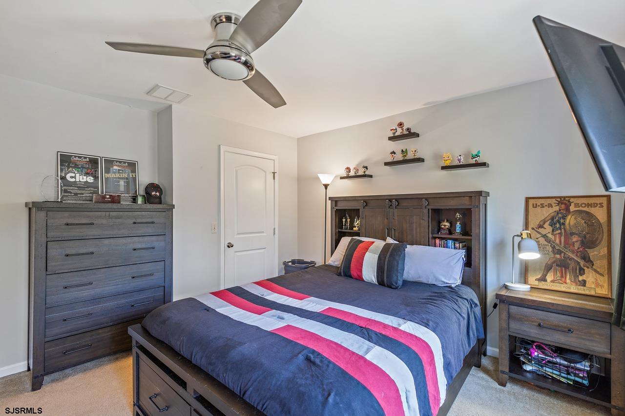 344 Old New York Road Port Republic, NJ 08241 - Photo 74 of 99 a bedroom with a bed and a dresser