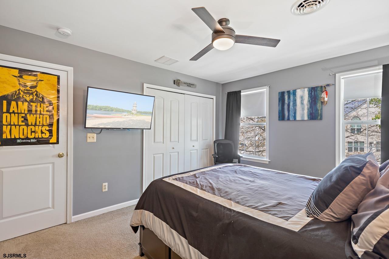344 Old New York Road Port Republic, NJ 08241 - Photo 77 of 99 a bedroom with a bed and a window