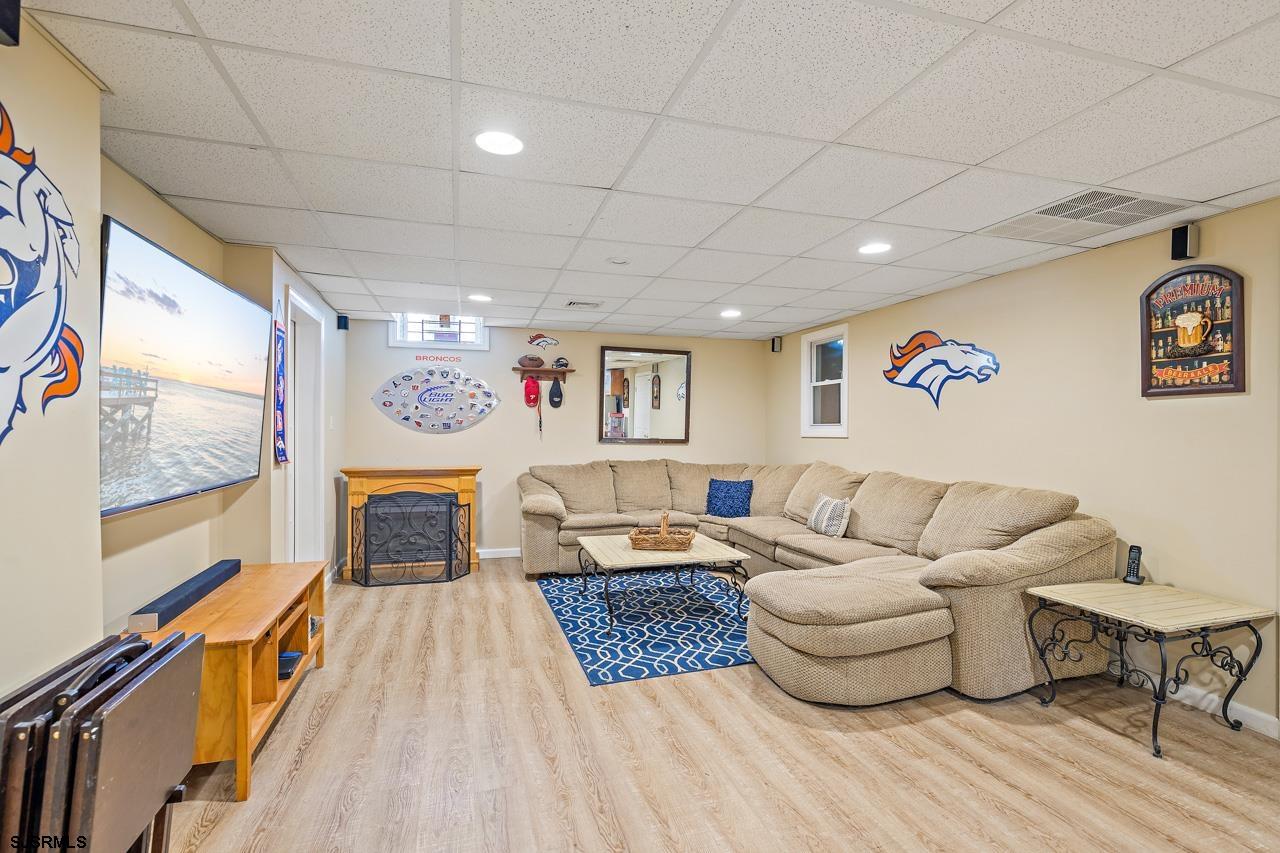 344 Old New York Road Port Republic, NJ 08241 - Photo 85 of 99 a living room with furniture and a flat screen tv