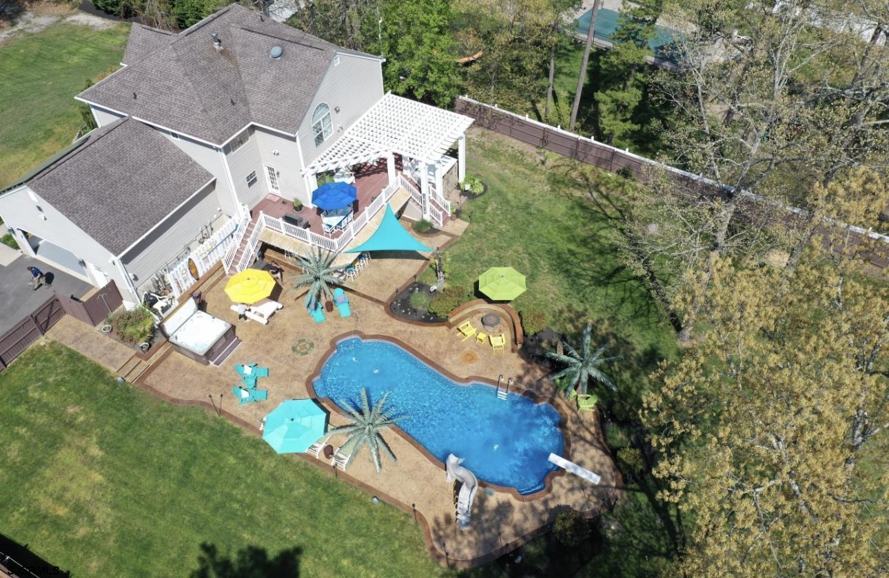 344 Old New York Road Port Republic, NJ 08241 - Photo 92 of 99 an aerial view of a house with a swimming pool