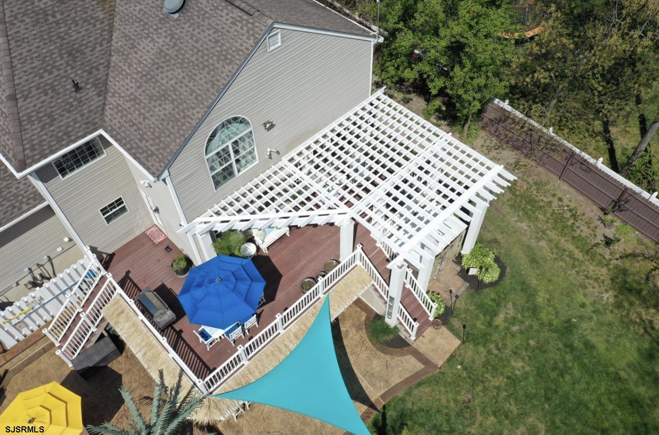 344 Old New York Road Port Republic, NJ 08241 - Photo 93 of 99 a view of roof deck with wooden floor and fence