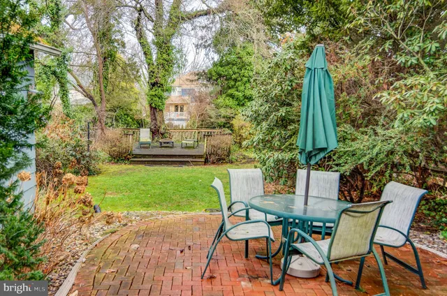 a view of yard with patio and yard