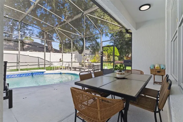 a view of a livingroom with furniture and a table