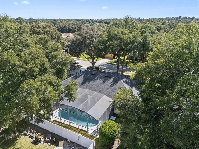 an aerial view of a city with mountains