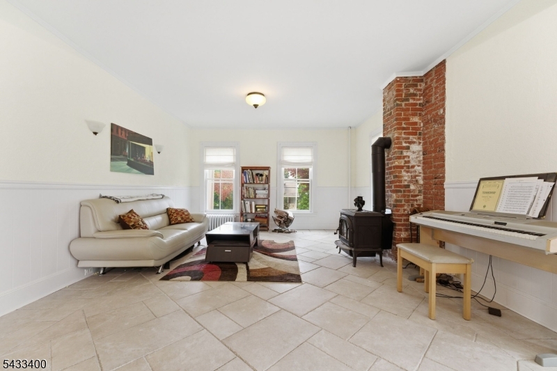 61 New Street Hampton, NJ 08827 - Photo 22 of 45 a living room with furniture and a potted plant
