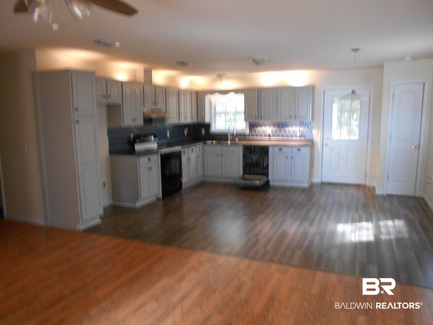 13408 Pendix Road Summerdale, AL 36580 - Photo 13 of 31 From Living Room. Special lighting stands out.