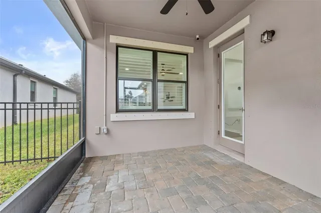 a view of a porch with a garden
