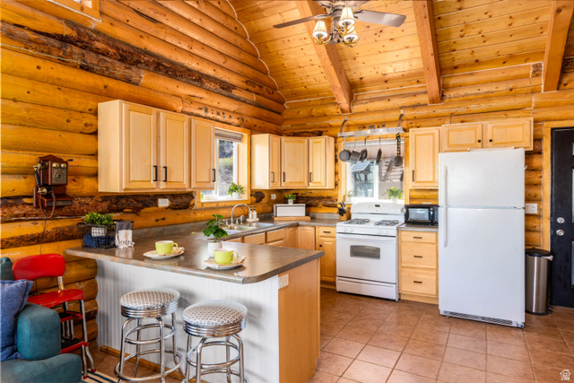 706 Tranquility Drive Springdale, UT 84767 - Photo 9 of 55 Gourmet Cabin Kitchen: Features custom cabinetry, ample counter space, and a convenient breakfast bar.