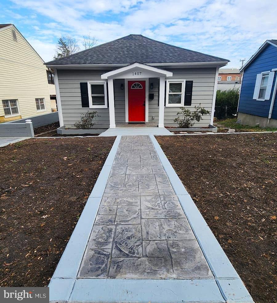 a front view of house with yard