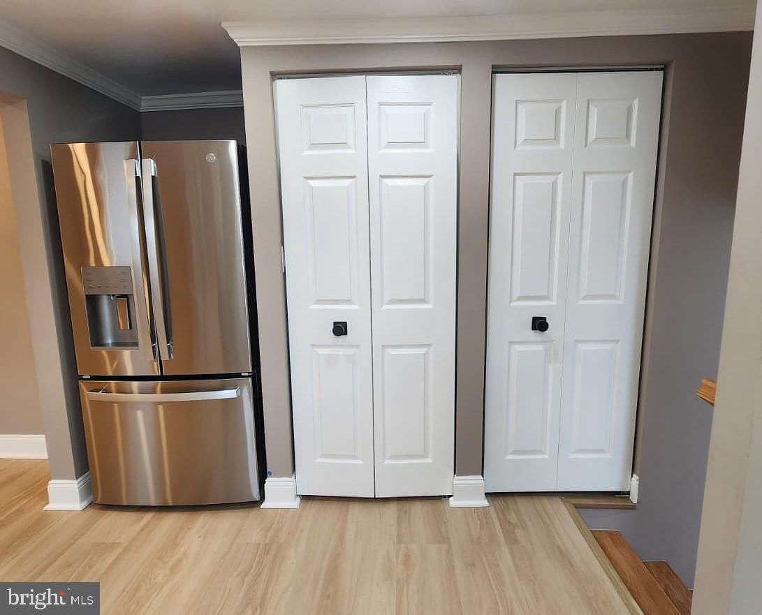 1407 Sunken Road Fredericksburg, VA 22401 - Photo 19 of 39 a view of kitchen with wooden floor refrigerator and window