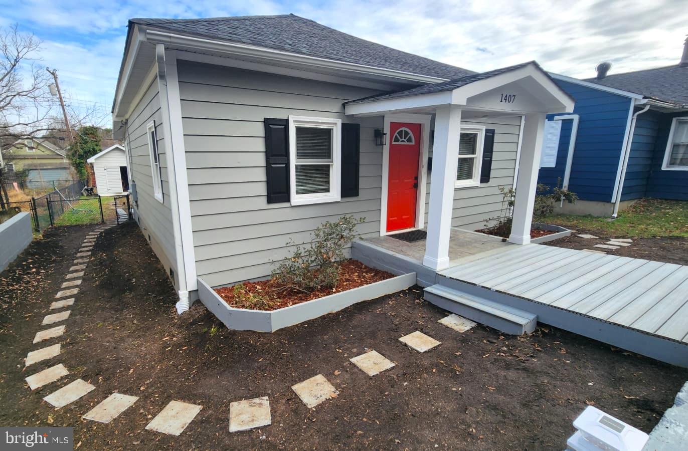 1407 Sunken Road Fredericksburg, VA 22401 - Photo 3 of 39 a front view of house with yard