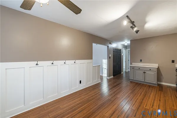 a view of a livingroom with wooden floor