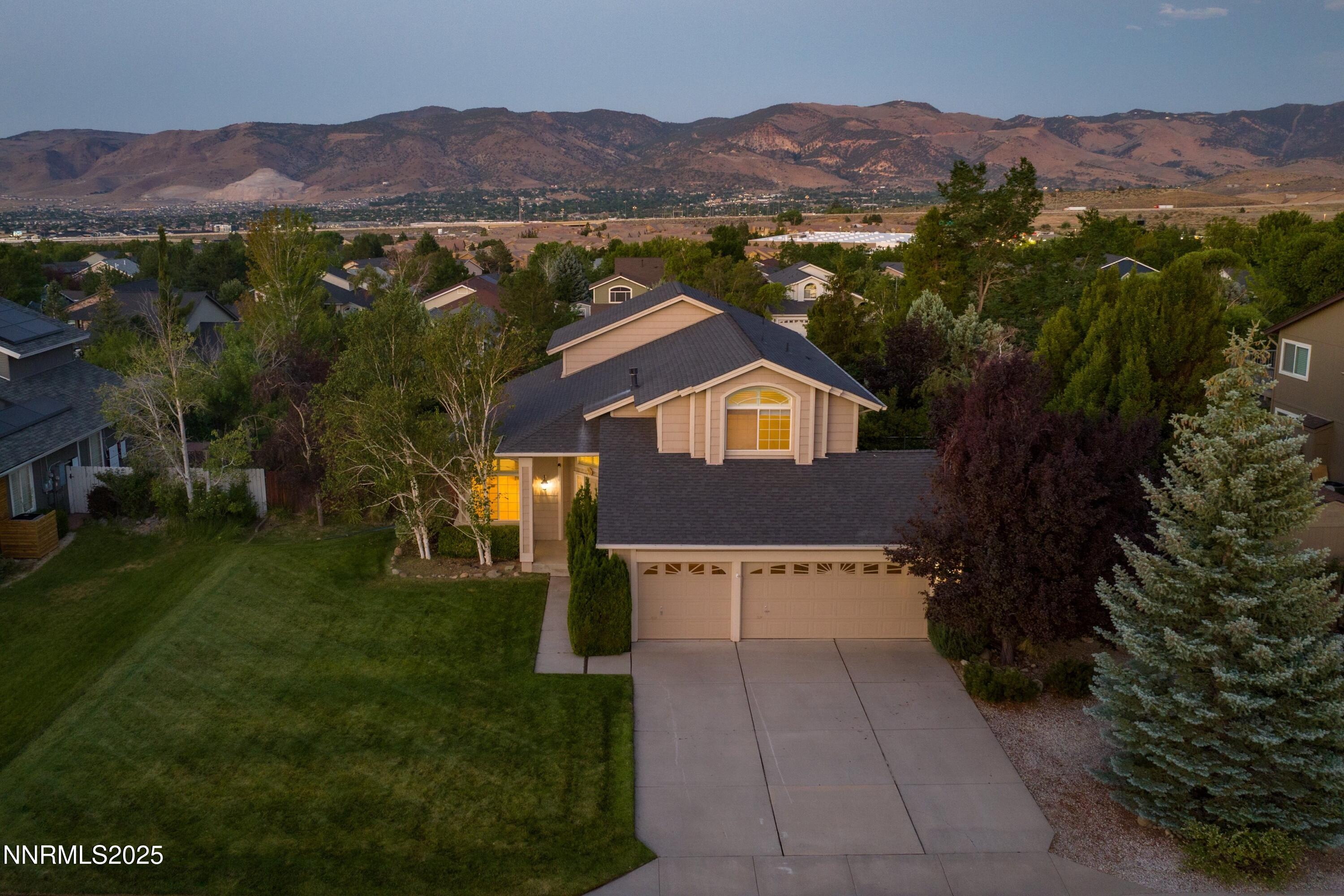 14330 Ghost Rider Drive Reno, NV 89511 - Photo 1 of 41 a view of house and outdoor space