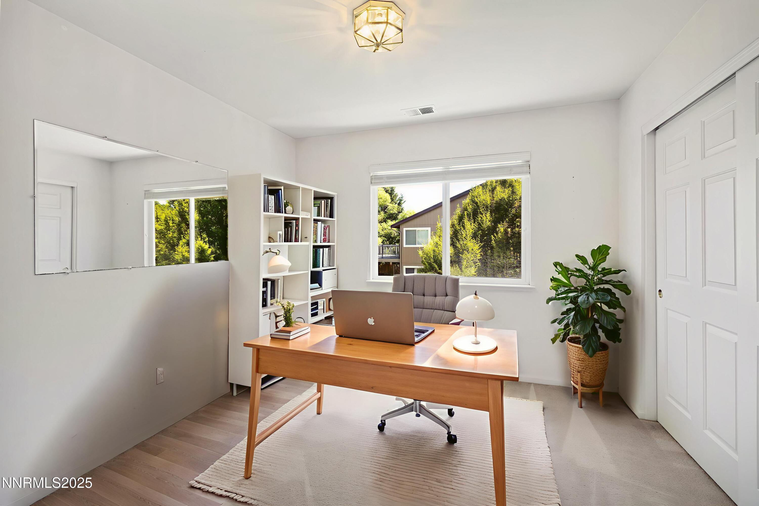 14330 Ghost Rider Drive Reno, NV 89511 - Photo 22 of 41 a workspace with furniture and window