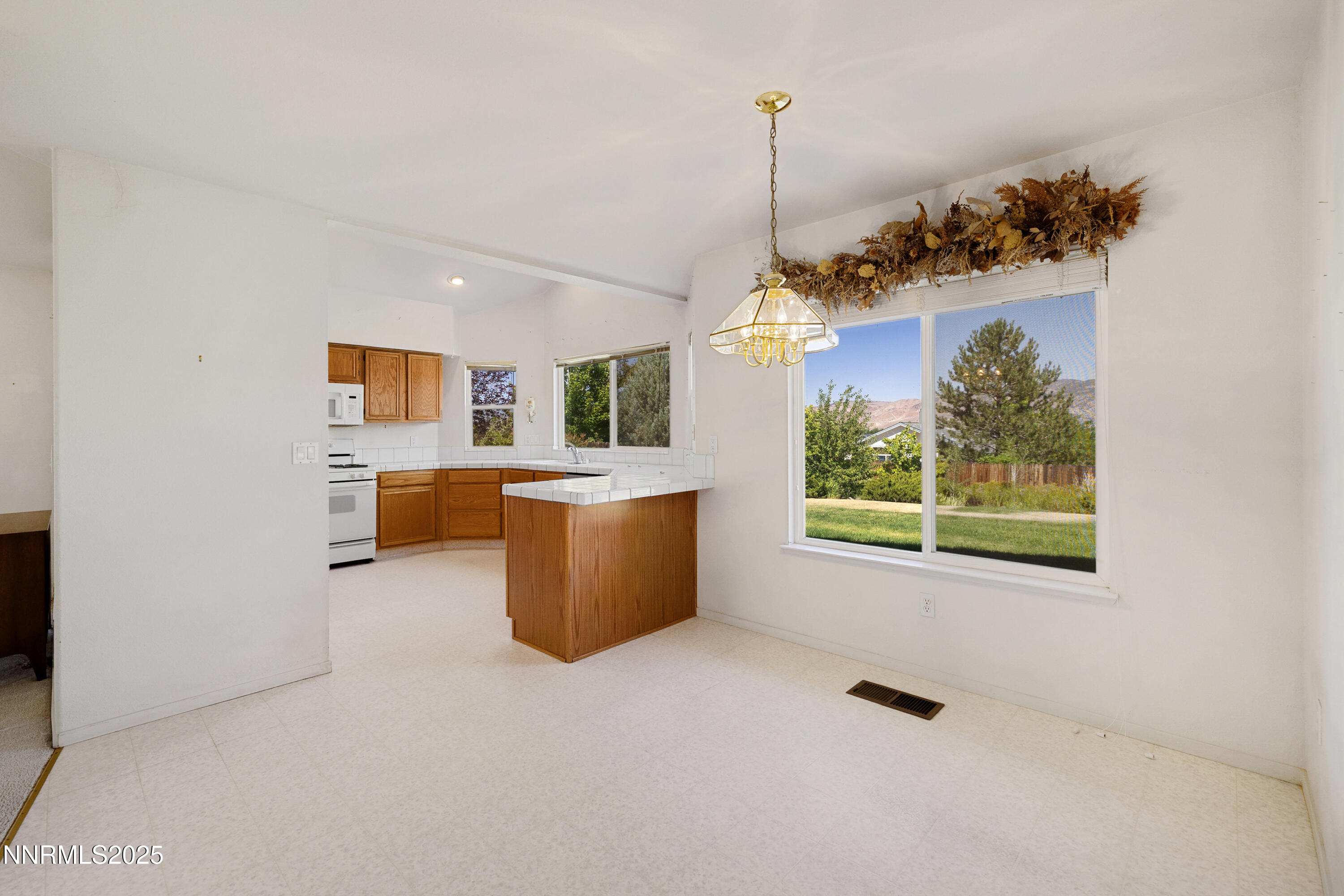 14330 Ghost Rider Drive Reno, NV 89511 - Photo 26 of 41 a view of a room with windows