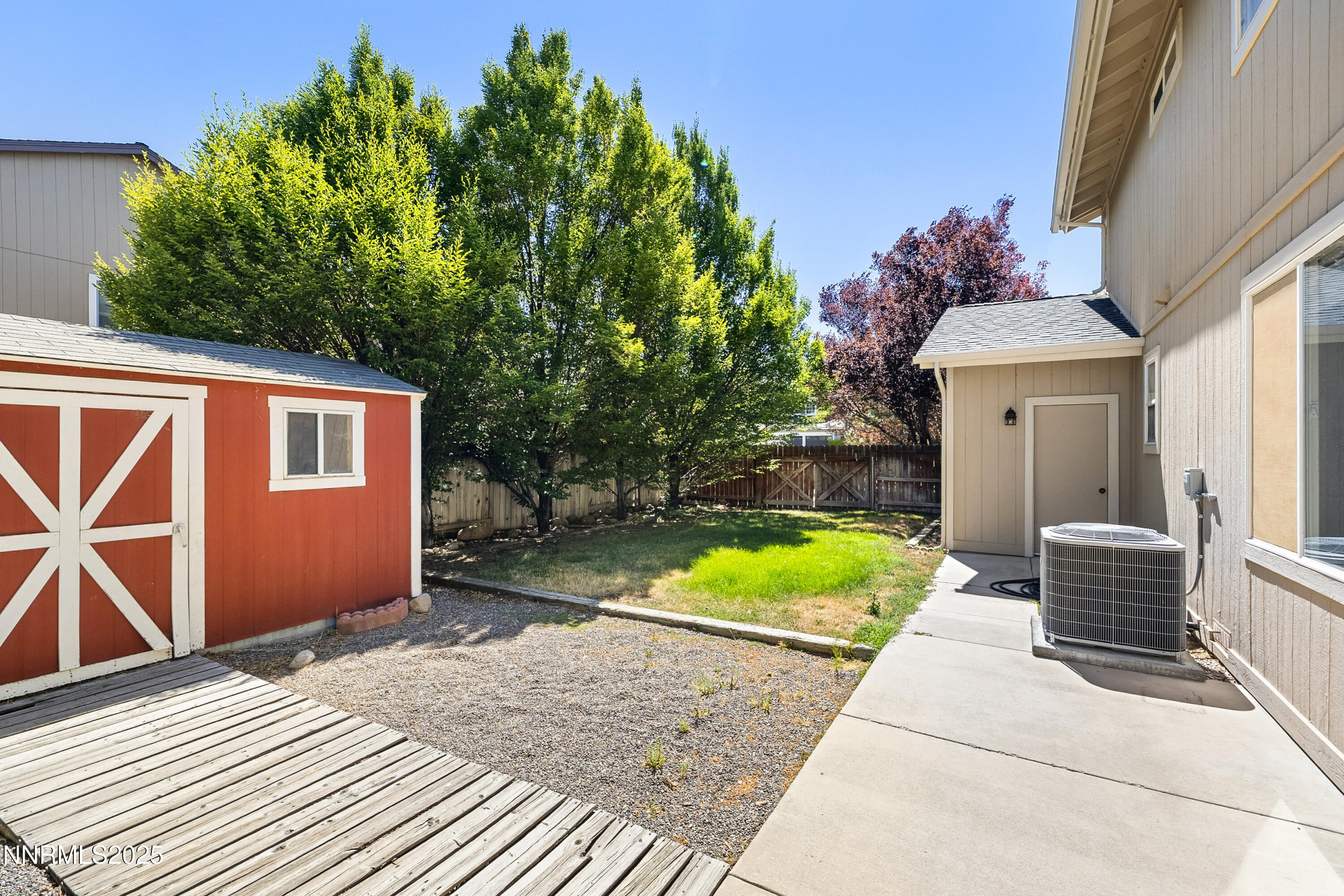 14330 Ghost Rider Drive Reno, NV 89511 - Photo 31 of 41 a front view of a house with a yard