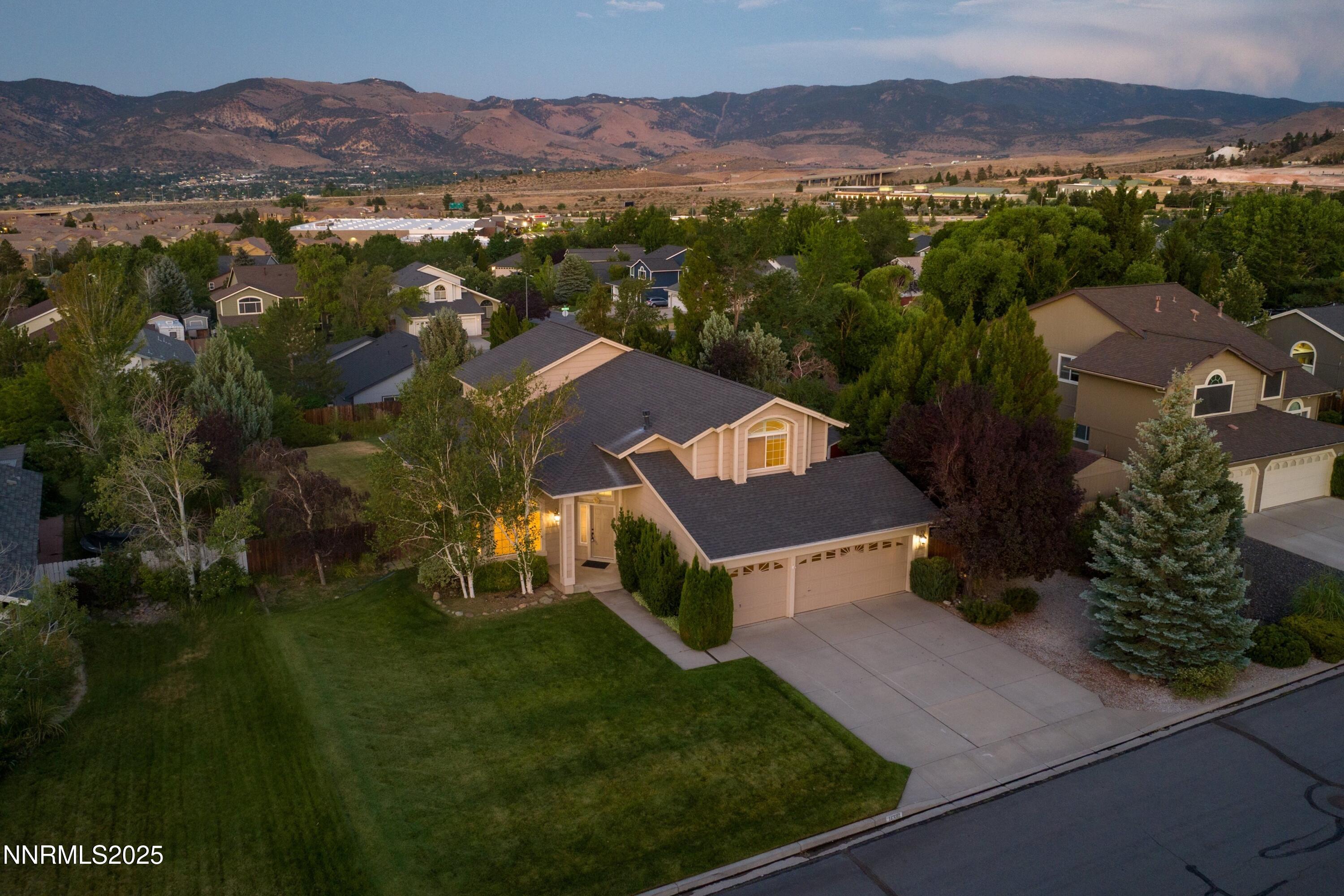 14330 Ghost Rider Drive Reno, NV 89511 - Photo 32 of 41 an aerial view of residential houses and outdoor space