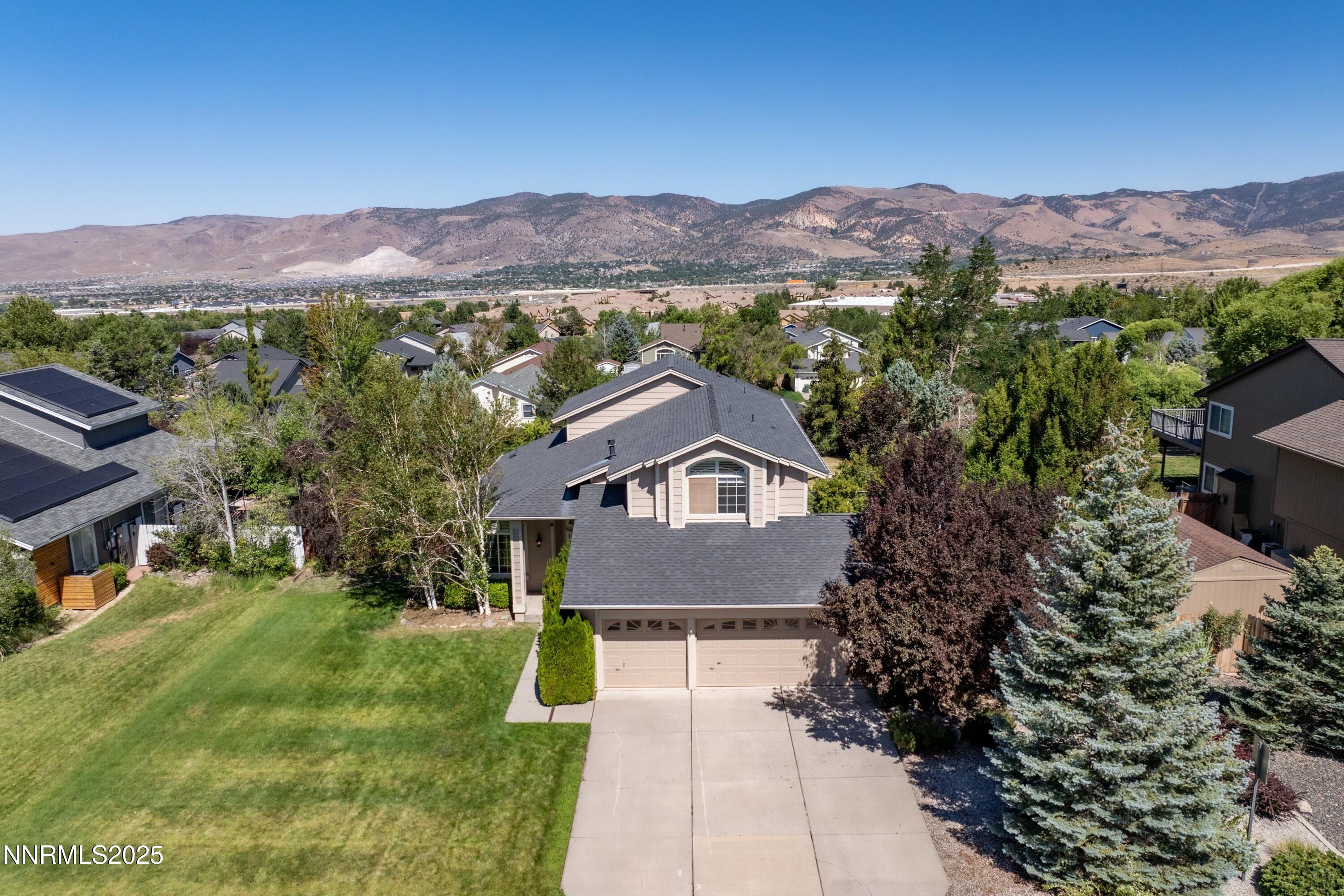 14330 Ghost Rider Drive Reno, NV 89511 - Photo 34 of 41 a view of house and mountains