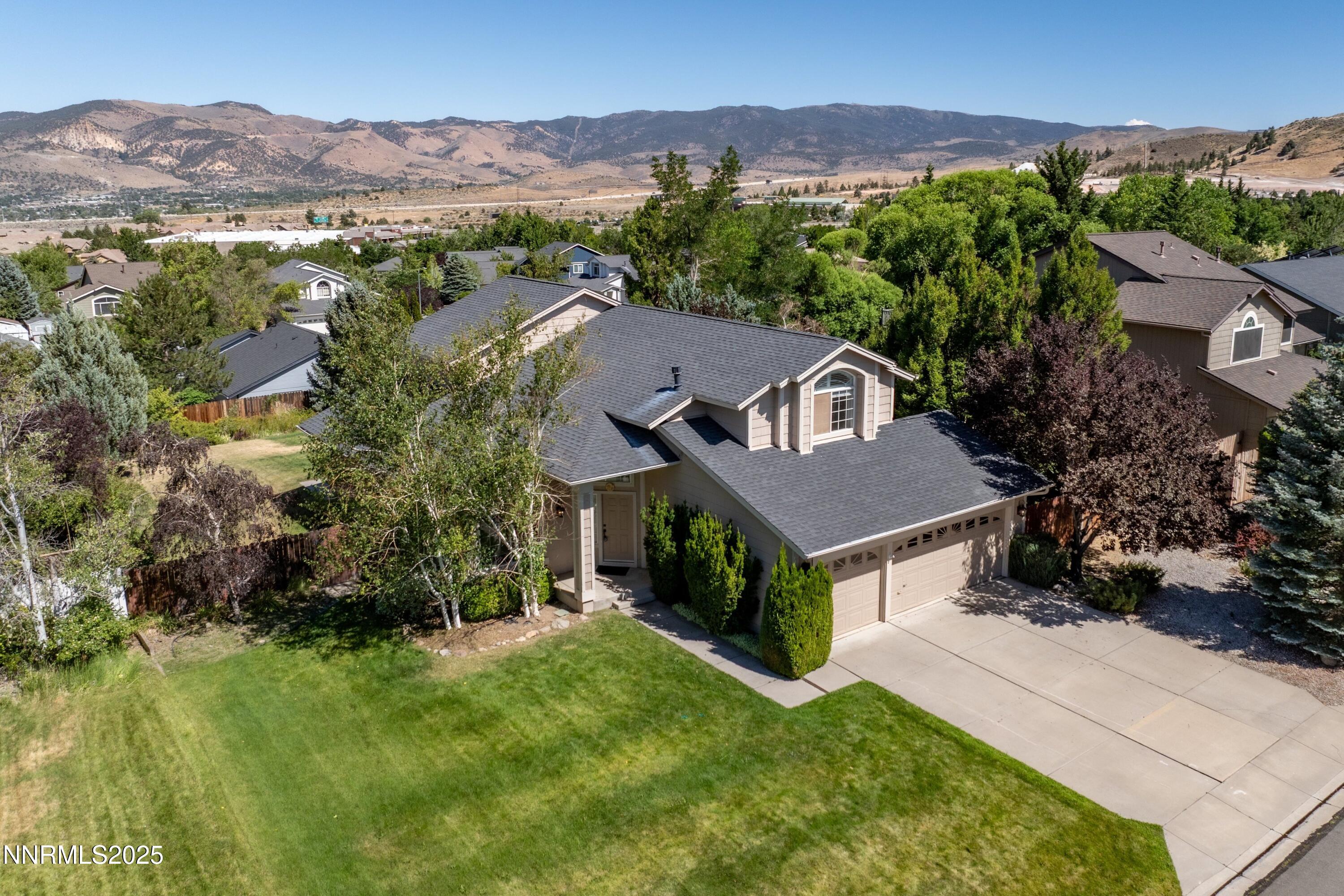 14330 Ghost Rider Drive Reno, NV 89511 - Photo 36 of 41 an aerial view of houses with yard