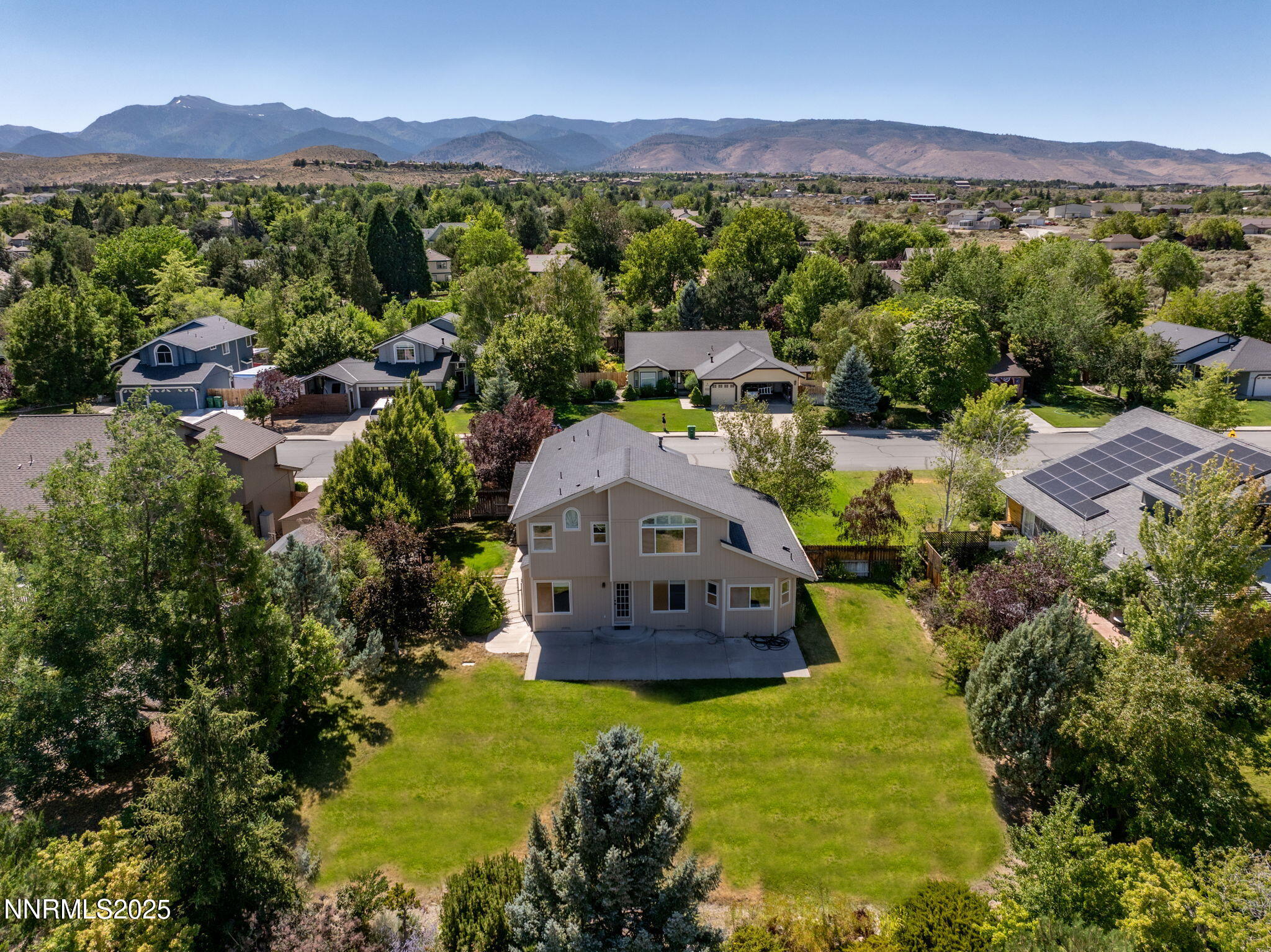14330 Ghost Rider Drive Reno, NV 89511 - Photo 38 of 41 a view of a house with a mountain in the background