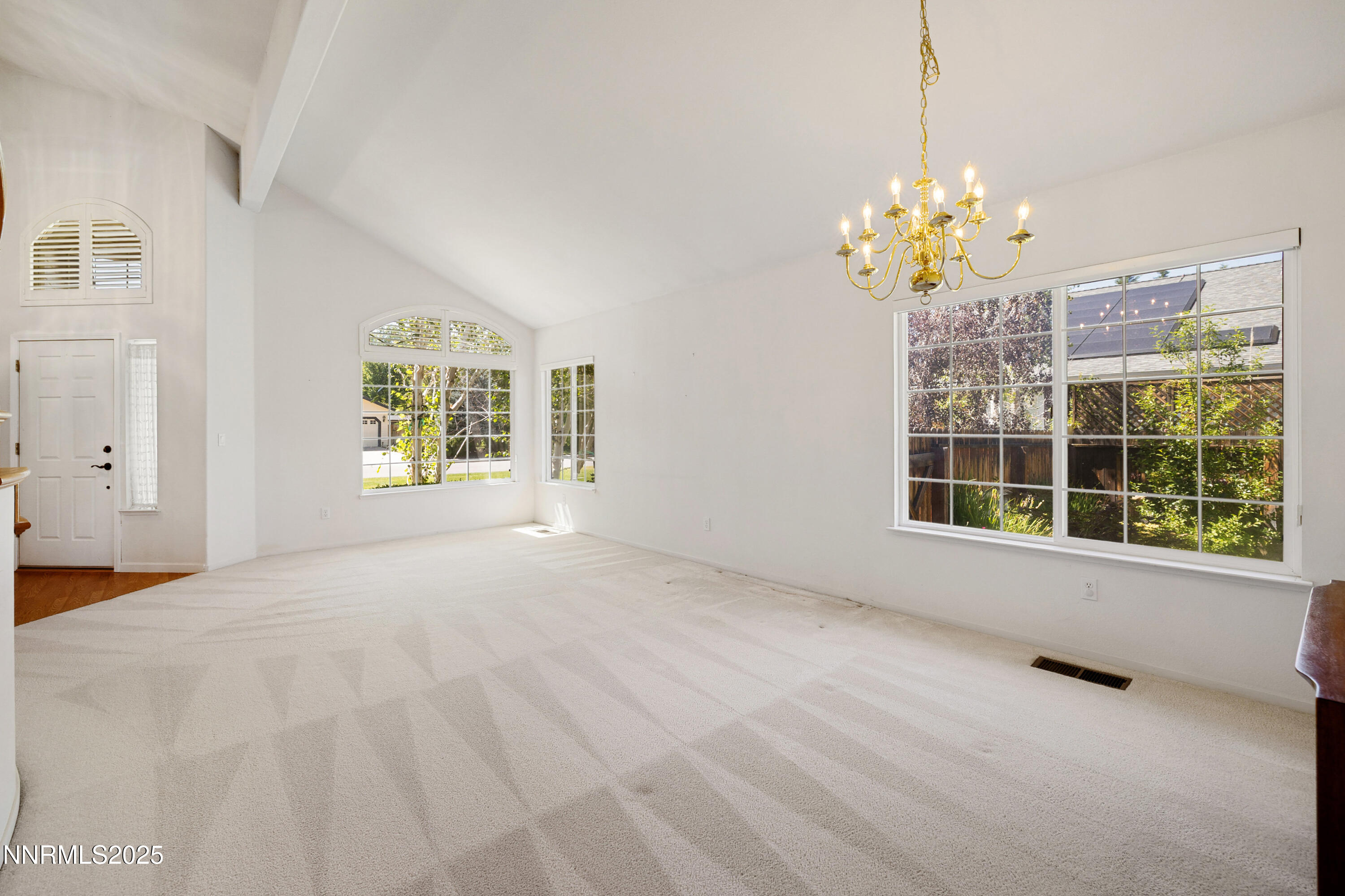 14330 Ghost Rider Drive Reno, NV 89511 - Photo 7 of 41 a view of an empty room with a window