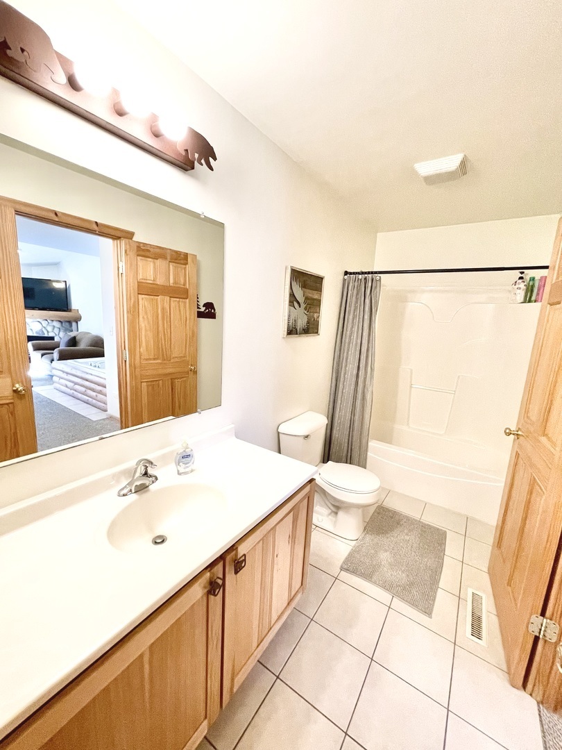 2643 Highway 178, Unit Y3 Oglesby, IL 61348 - Photo 18 of 31 a bathroom with a sink a mirror and a shower