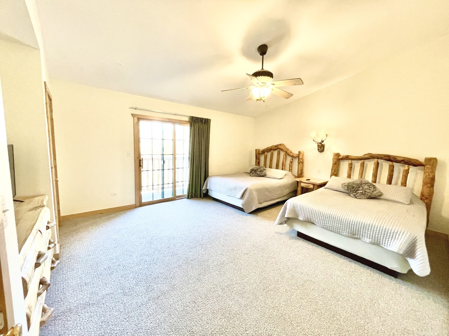 2643 Highway 178, Unit Y3 Oglesby, IL 61348 - Photo 19 of 31 a spacious bedroom with two beds and a chandelier