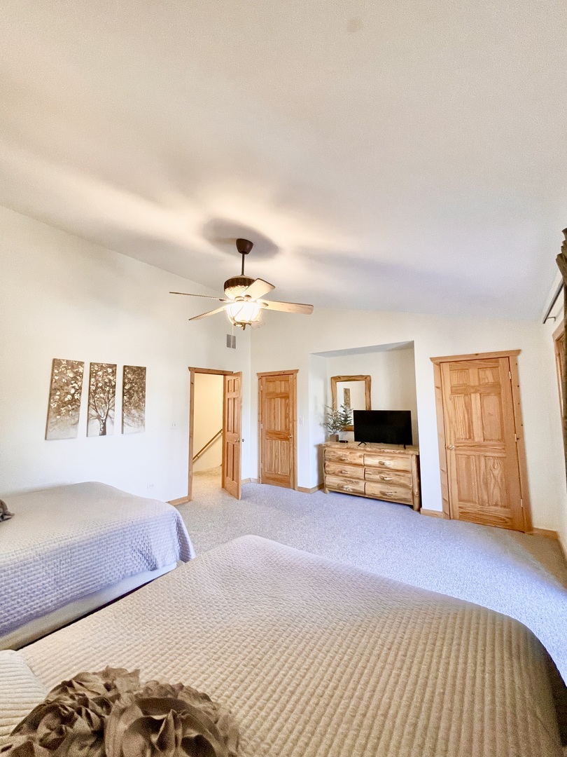 2643 Highway 178, Unit Y3 Oglesby, IL 61348 - Photo 24 of 31 a spacious bedroom with a bed and wooden floor