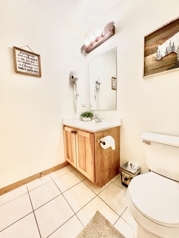 2643 Highway 178, Unit Y3 Oglesby, IL 61348 - Photo 26 of 31 a bathroom with a sink a toilet and a mirror