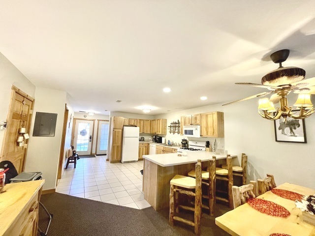 2643 Highway 178, Unit Y3 Oglesby, IL 61348 - Photo 5 of 31 a living room with stainless steel appliances kitchen island granite countertop furniture and a view of kitchen