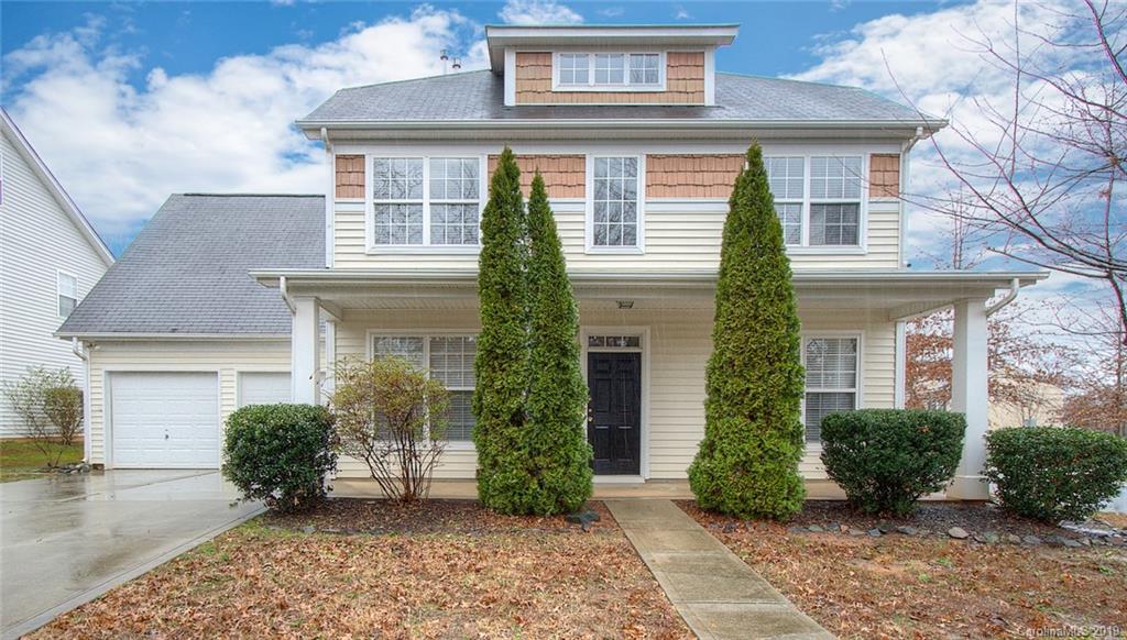 9824 Caldwell Depot Road Cornelius, NC 28031 - Photo 1 of 29 a front view of a house with garden