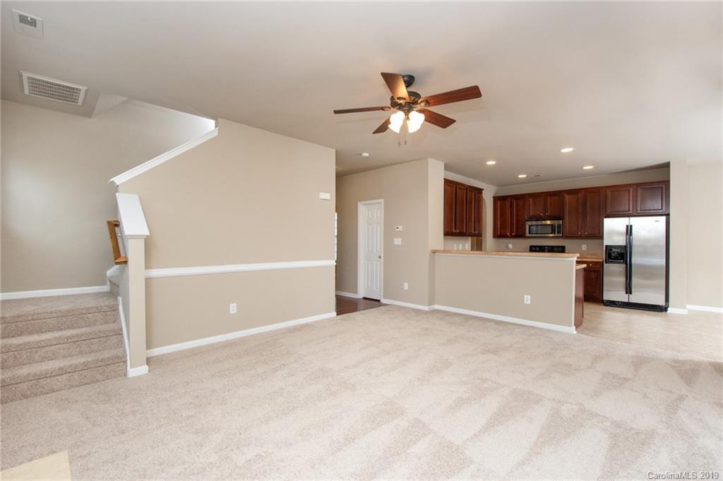 9824 Caldwell Depot Road Cornelius, NC 28031 - Photo 12 of 29 a view of a kitchen with a sink and a window