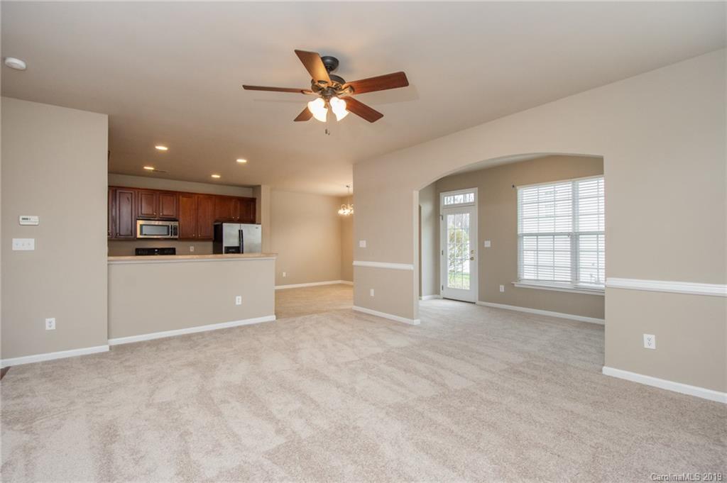 9824 Caldwell Depot Road Cornelius, NC 28031 - Photo 13 of 29 a view of an empty room with window and cabinet