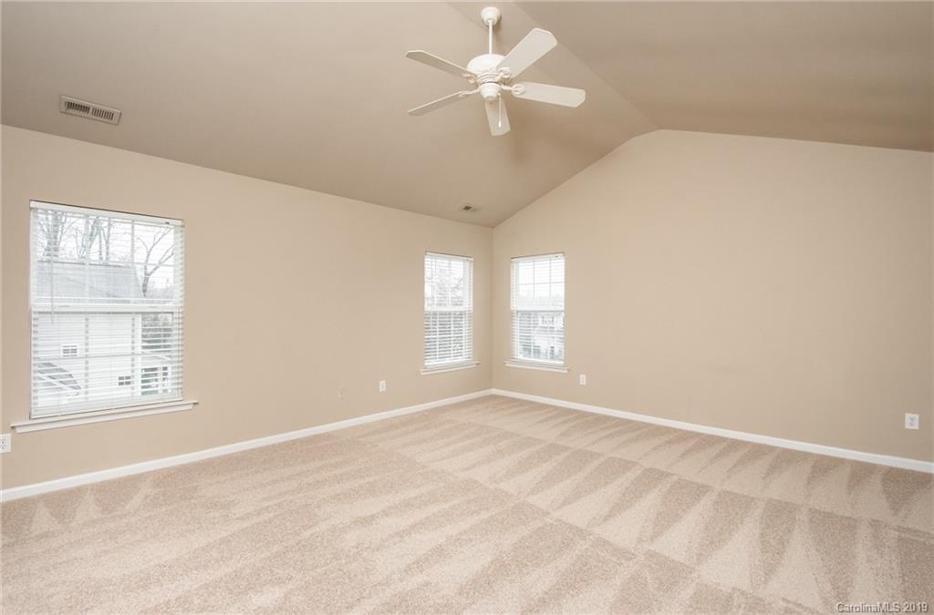 9824 Caldwell Depot Road Cornelius, NC 28031 - Photo 18 of 29 a view of an empty room with a window