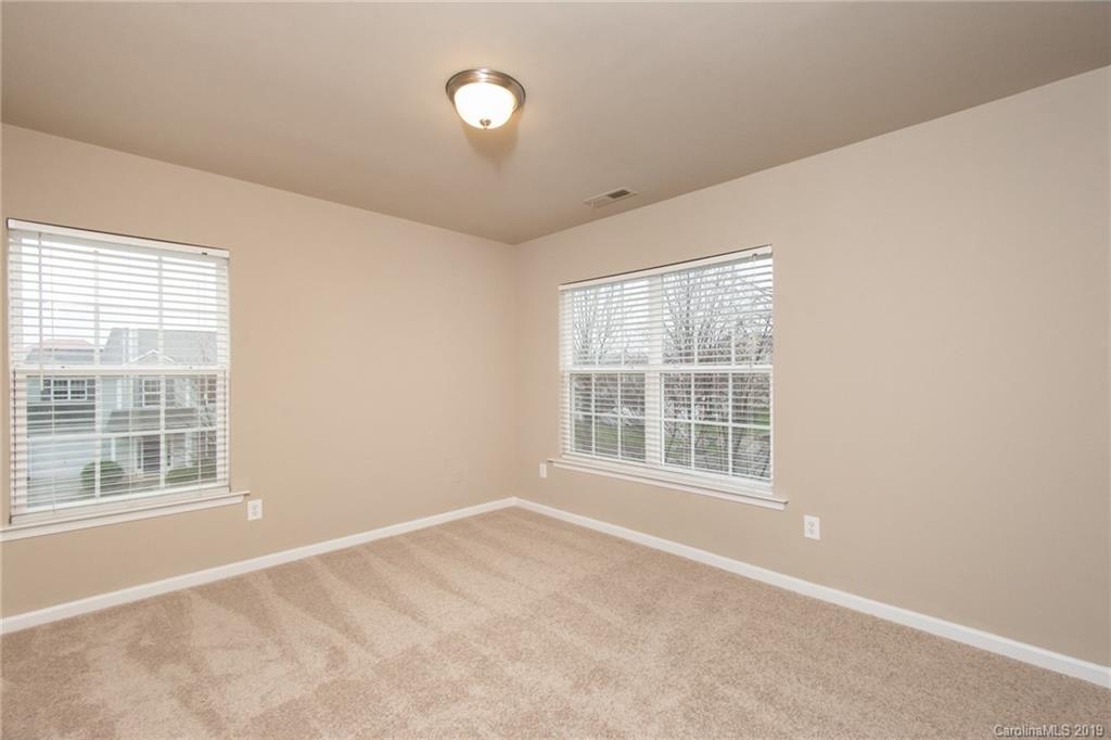 9824 Caldwell Depot Road Cornelius, NC 28031 - Photo 21 of 29 an empty room with a window