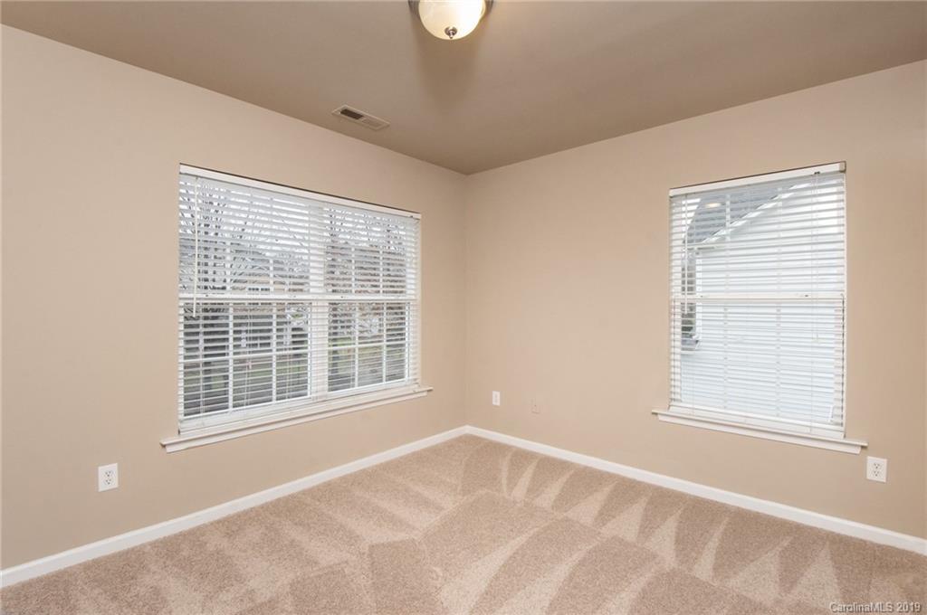 9824 Caldwell Depot Road Cornelius, NC 28031 - Photo 22 of 29 a view of an empty room with a window