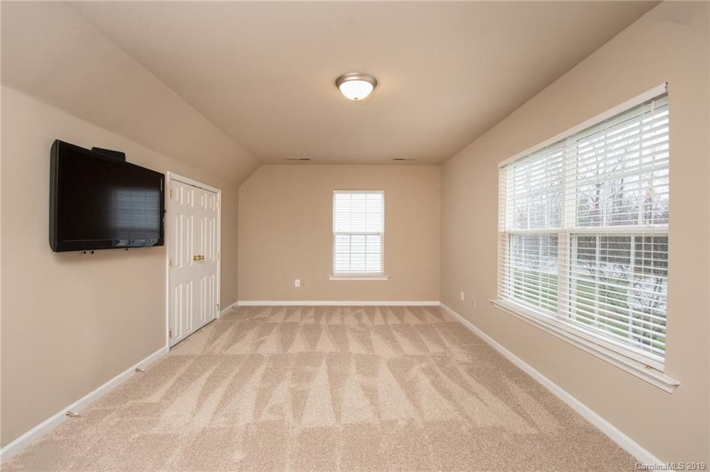 9824 Caldwell Depot Road Cornelius, NC 28031 - Photo 24 of 29 a view of an empty room with a window
