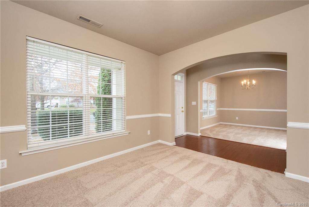 9824 Caldwell Depot Road Cornelius, NC 28031 - Photo 5 of 29 a view of an empty room with a window