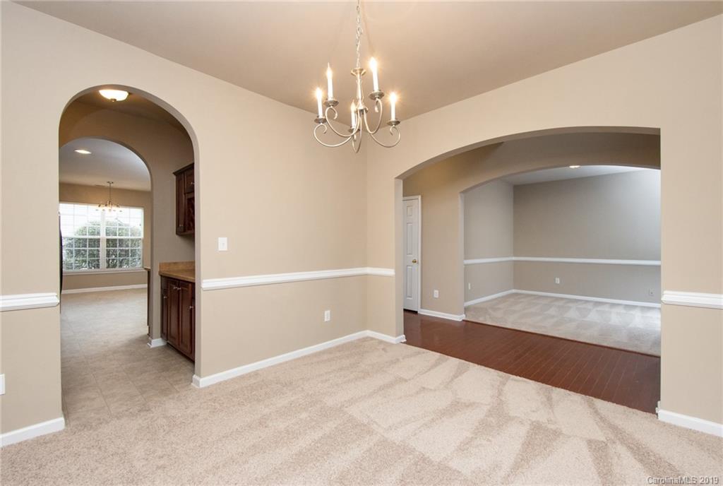 9824 Caldwell Depot Road Cornelius, NC 28031 - Photo 6 of 29 a view of a livingroom with a chandelier