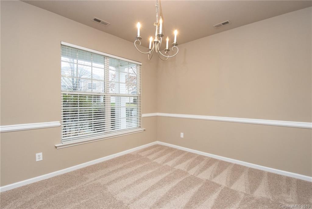 9824 Caldwell Depot Road Cornelius, NC 28031 - Photo 8 of 29 a view of a livingroom with a window