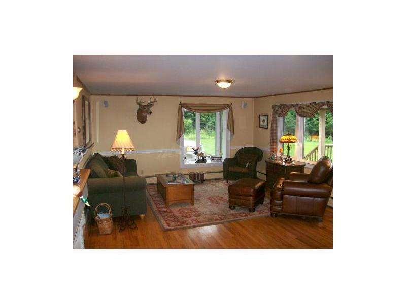59 Conifer Road Rangeley, ME 04970 - Photo 3 of 8 Living Room. Spacious living room...