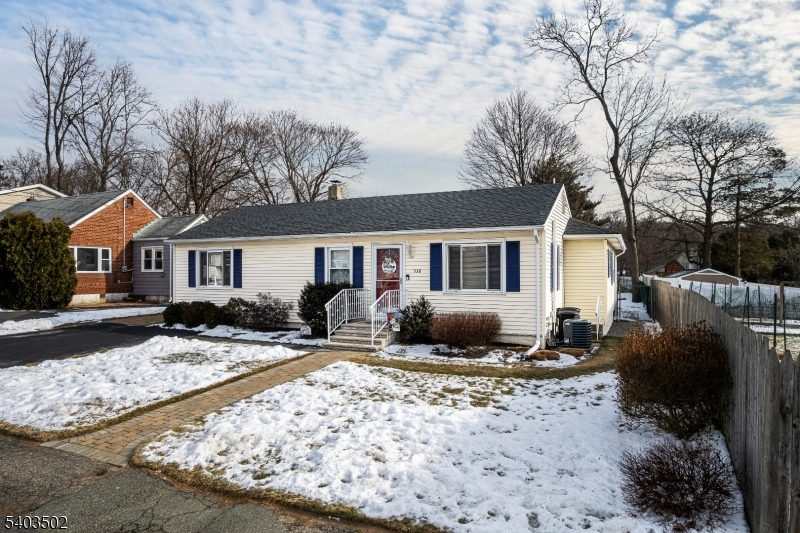 538 Vail Road Landing, NJ 07850 - Photo 2 of 26 a front view of house with yard outdoor seating and barbeque oven