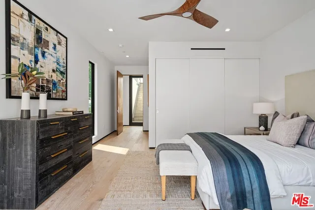 a view of a terrace with couches and sky view