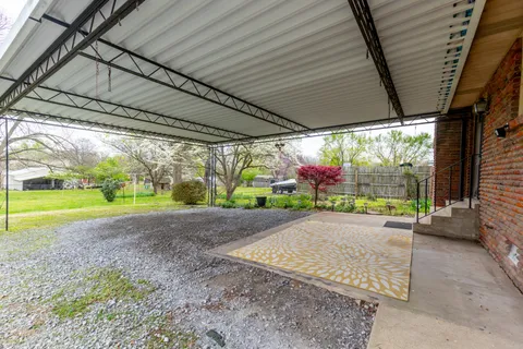 a view of a porch with garden