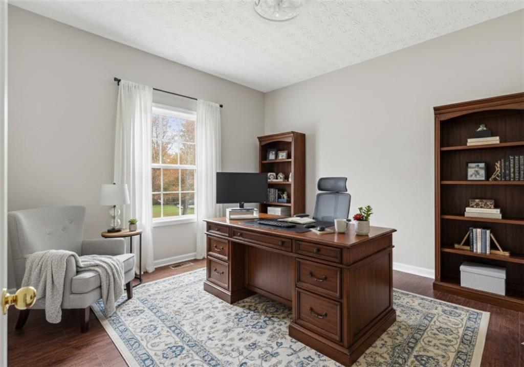 125 Nelson Oaks Drive Ball Ground, GA 30107 - Photo 17 of 41 a view of a workspace with furniture and a window