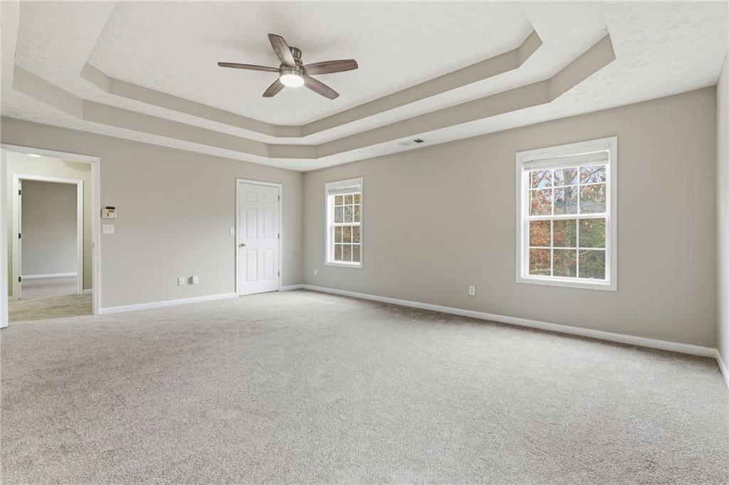 125 Nelson Oaks Drive Ball Ground, GA 30107 - Photo 23 of 41 a view of an empty room with a window