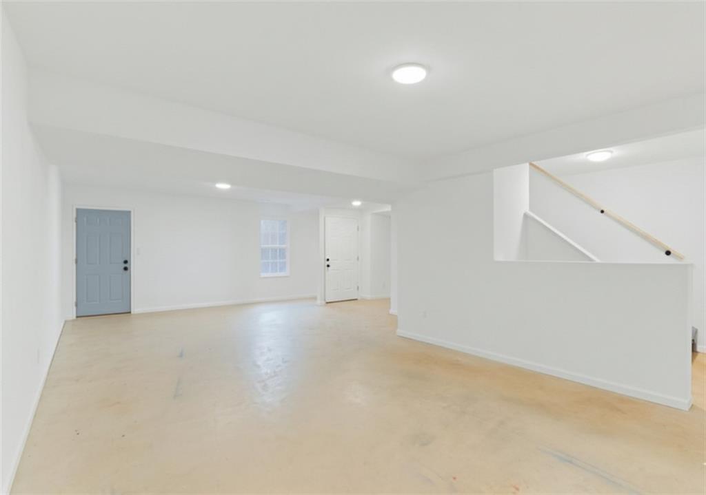 125 Nelson Oaks Drive Ball Ground, GA 30107 - Photo 32 of 41 an empty room with an entryway