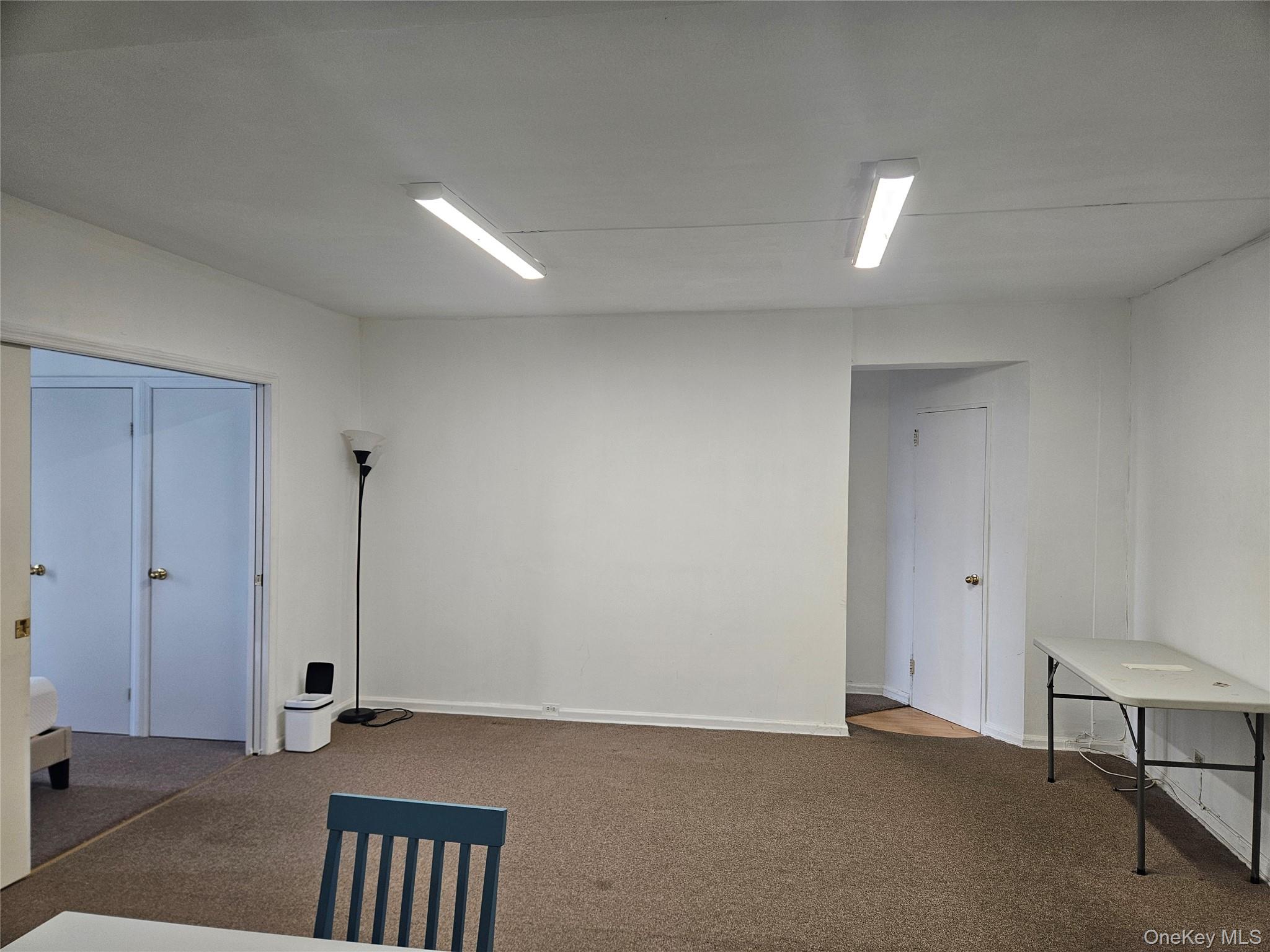 98-25 64th Road, Unit 8F Queens, NY 11374 - Photo 2 of 8 a view of an empty room