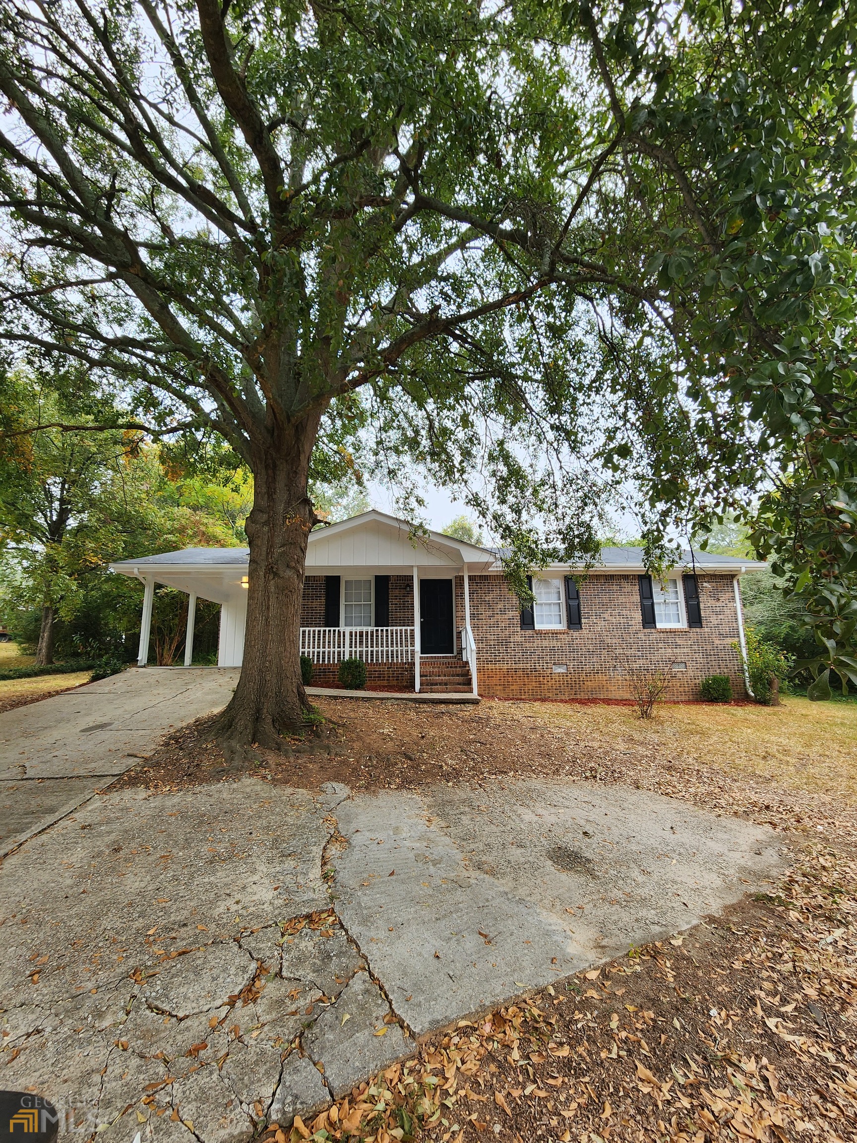 200 Capitol Avenue Winder, GA 30680 - Photo 1 of 1 a tree in front of a white house