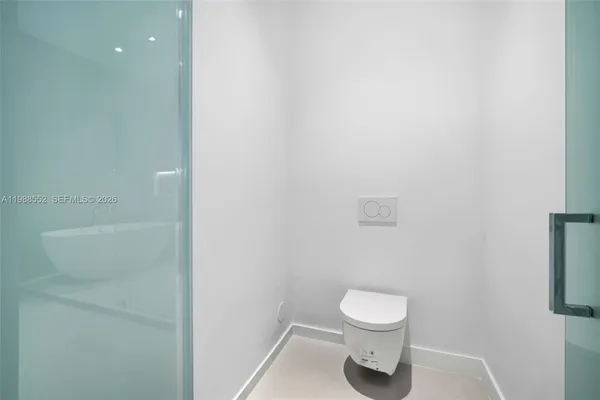 a bathroom with a toilet